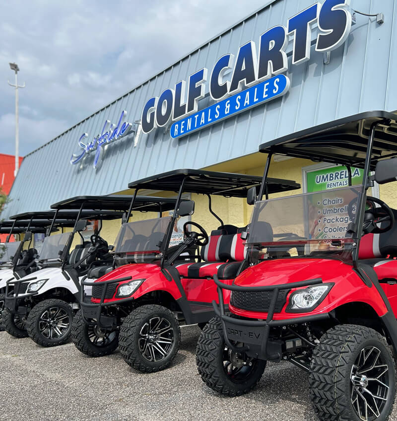 Golf cart rentals parked outside our Surfside Beach shop